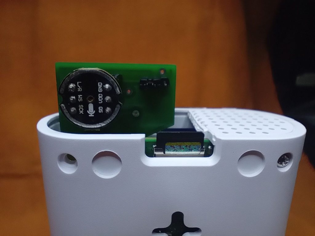 The hole with the microphone mark as audio input to the sensor