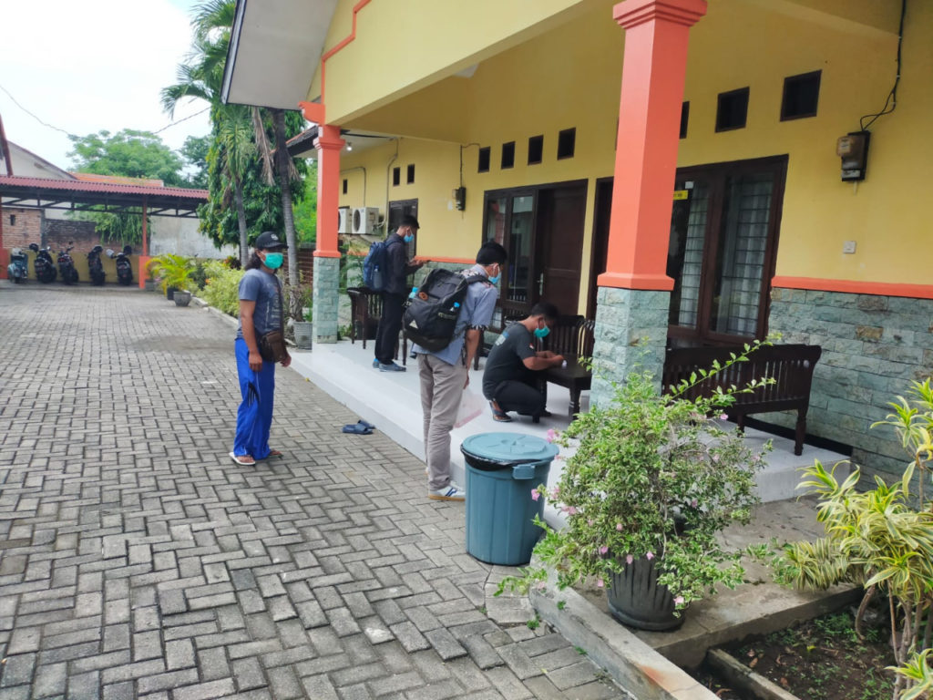 The ITS Covid Task Force team checks and controls the independent isolation room provided for people exposed to Covid-19