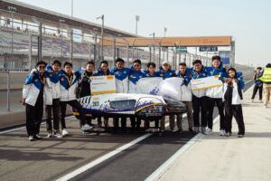 Team Antasena ITS alongside their Hydrogen Fuel Cell Prototype vehicle on the track of the 2026 Shell Eco-marathon Asia Pacific and the Middle East in Qatar.