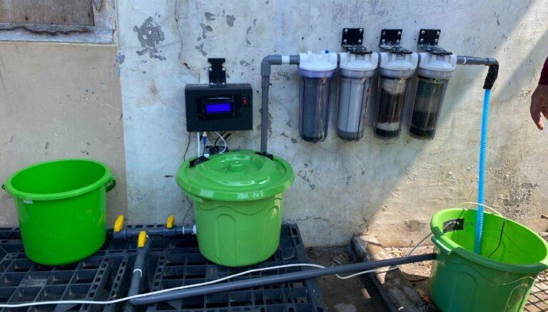 The IoT-based well water filtration unit installed in the Keputih Tegal Bakti residential area.