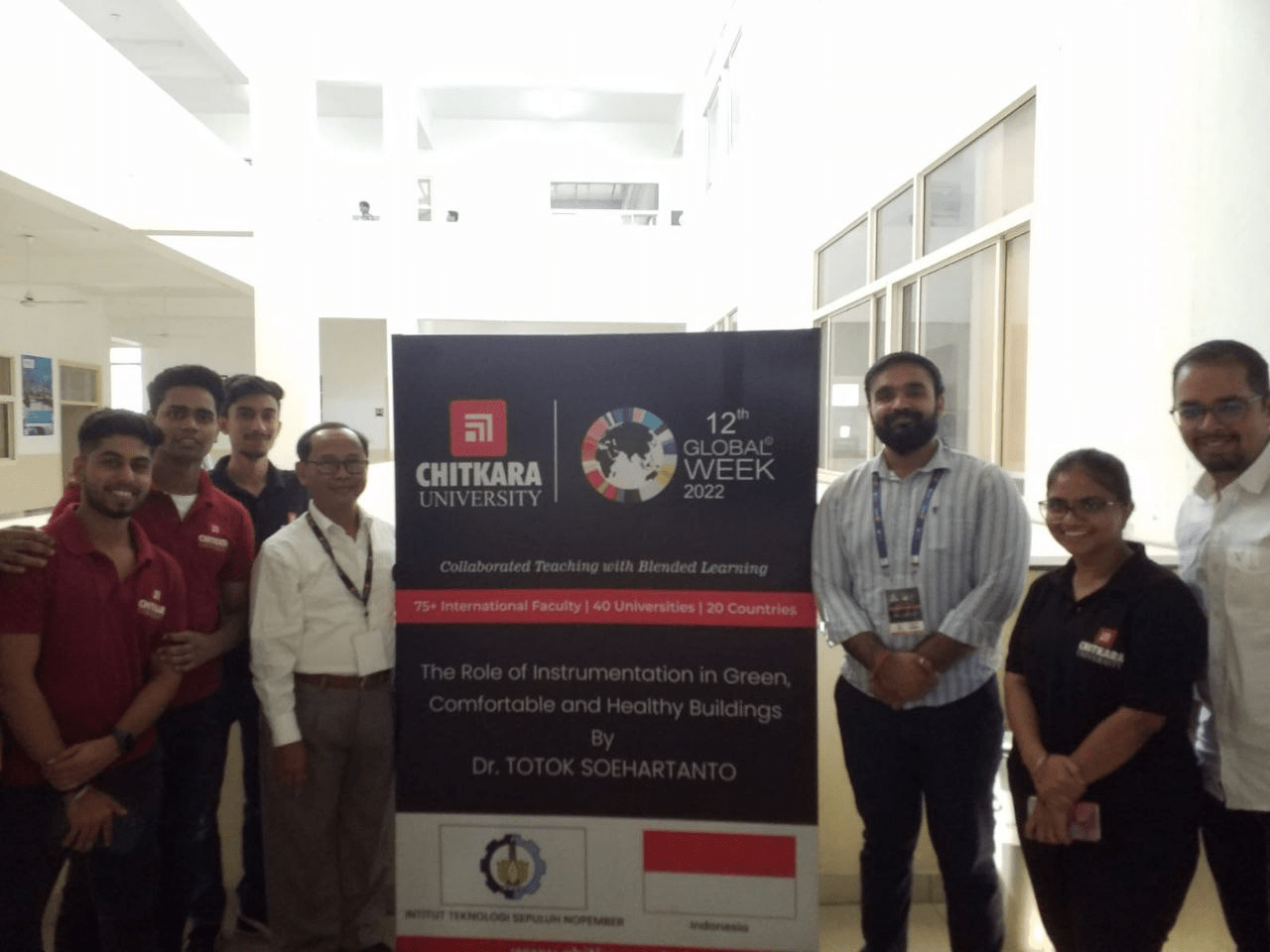 Portrait of Mr. Dr.Ir.Totok Soehartanto together with Chitkara University students